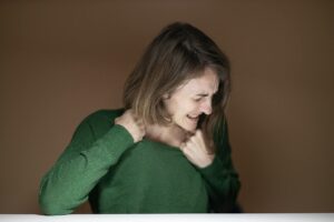 woman wearing green sweater